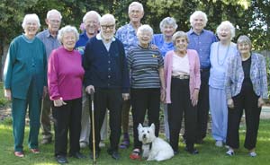 The residents of the first elder cohousing community in the United States––Glacier Circle Senior Community in Davis, California––gather for a group shot.